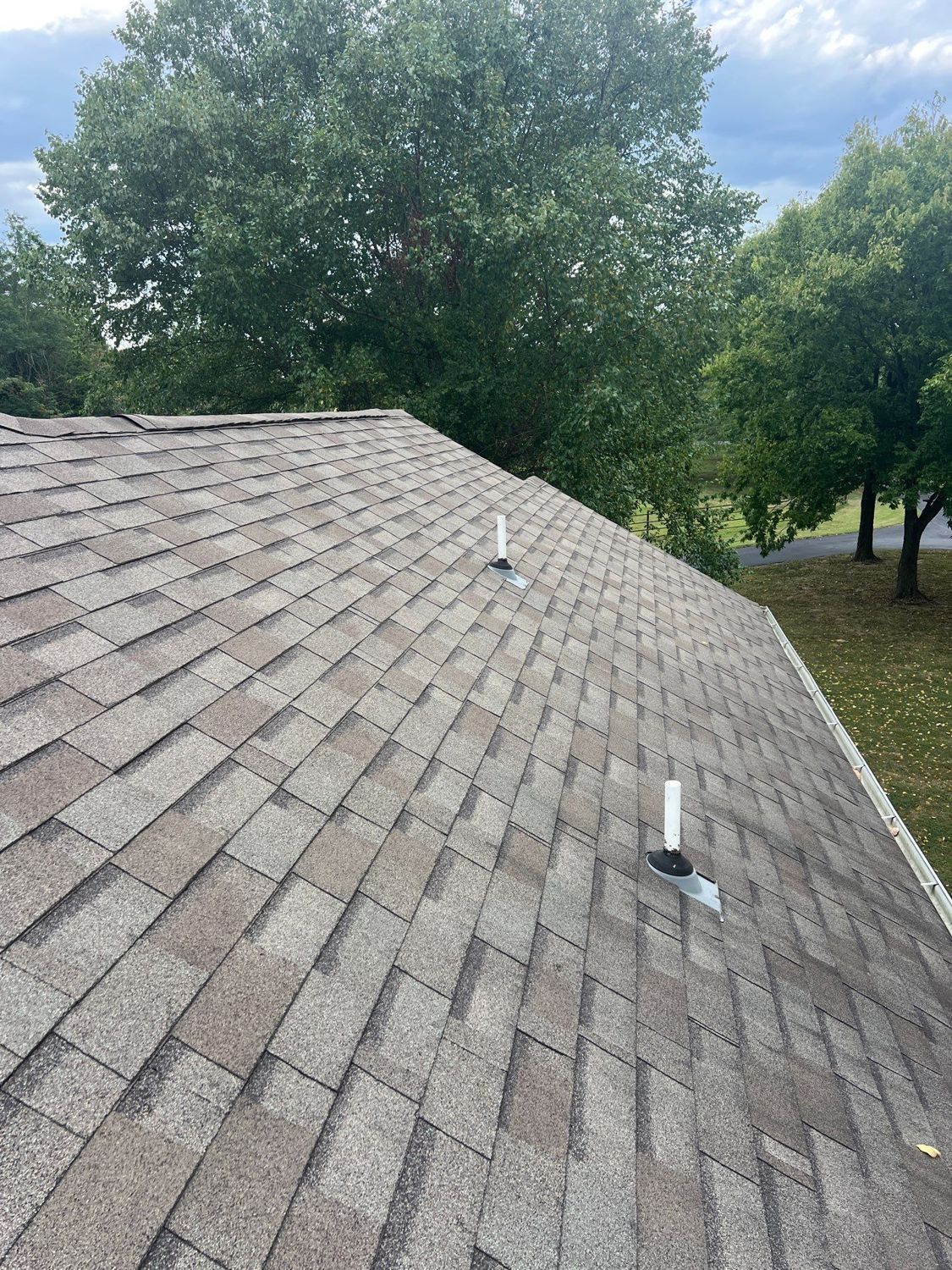 Finished architectural shingle roof installed by Nixa Roof Co
